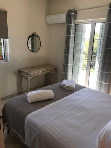 A bed or beds in a room at Venetia apartment
