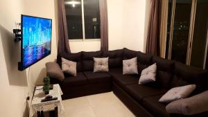 TV a/nebo společenská místnost v ubytování Altamira Cozy apartment with amazing views + 37 fotografií