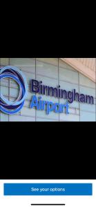 a sign for a bmw air port on the side of a building at Arden House NEC Birmingham in Bickenhill