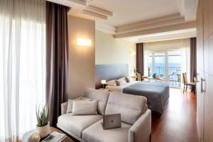 Кровать или кровати в номере Grand Hotel Spiaggia