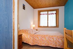 Postel nebo postele na pokoji v ubytování Les Mouflons