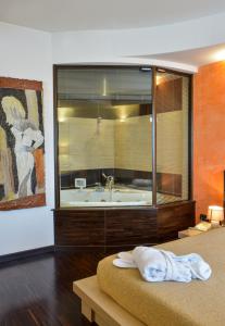Koupelna v ubytování Grand Hotel Olimpo