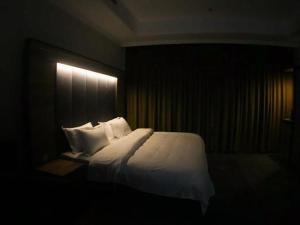 سرير أو أسرّة في غرفة في لافنت بارك