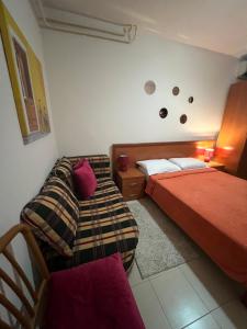 Postel nebo postele na pokoji v ubytování Apartment Plazza Rafailovici