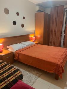 Postel nebo postele na pokoji v ubytování Apartment Plazza Rafailovici