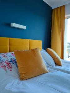 Posteľ alebo postele v izbe v ubytovaní Apartamenty Mistral