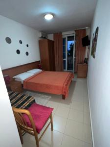 Postel nebo postele na pokoji v ubytování Apartment Plazza Rafailovici