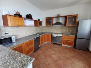 Kuchyňa alebo kuchynka v ubytovaní Apartment Vista Kali