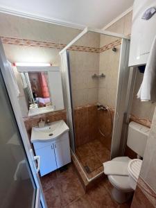 Koupelna v ubytování Apartment Plazza Rafailovici
