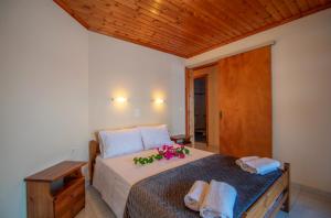 Postel nebo postele na pokoji v ubytování Aggelika Apartments