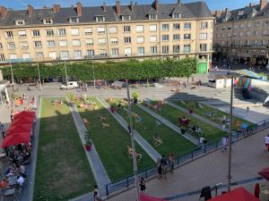 Hostia v ubytovaní Appartement spacieux lumineux hypercentre
