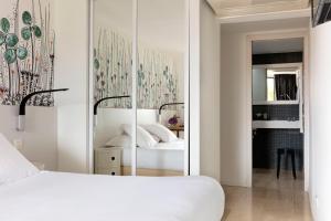 Posteľ alebo postele v izbe v ubytovaní Hotel Alcyon