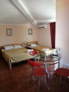 Postel nebo postele na pokoji v ubytování Apartments Adriatika