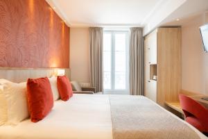 Postel nebo postele na pokoji v ubytování Prince Albert Lyon Bercy