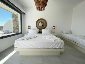 Krevet ili kreveti u jedinici u okviru objekta 3Waves Sea View Paros