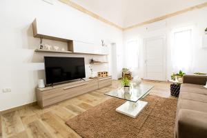 TV a/nebo společenská místnost v ubytování Appartamento in Salento