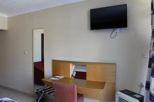 TV a/nebo společenská místnost v ubytování The St. George’s Park Hotel