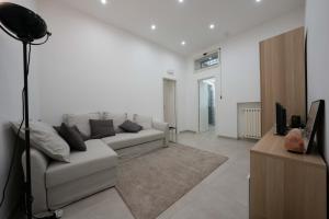 Televízia a/alebo spoločenská miestnosť v ubytovaní Gramsci Luxury apartment By Dimorra