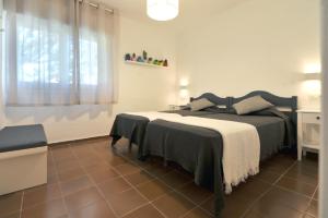 Ein Bett oder Betten in einem Zimmer der Unterkunft ROIG