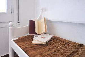 Ein Bett oder Betten in einem Zimmer der Unterkunft ROIG