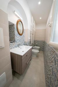 Kúpeľňa v ubytovaní Gramsci Luxury apartment By Dimorra