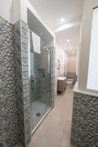 Kúpeľňa v ubytovaní Gramsci Luxury apartment By Dimorra