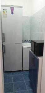 Kuchyň nebo kuchyňský kout v ubytování Apartament KEDA + 1 fotografie