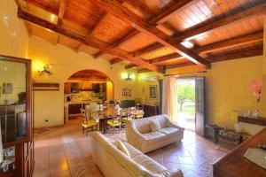 A seating area at Holiday home with private pool, Solarino