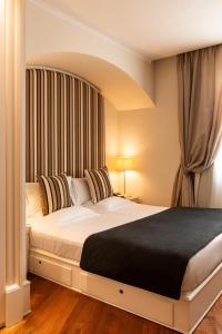 Postel nebo postele na pokoji v ubytování Eight Hotel Portofino