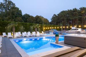 La alberca dentro o cerca de Ambre Mare Bursztynowe Apartamenty Pobierowo
