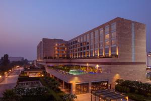 a large building with a courtyard in front of it at Hyatt Regency Chandigarh in Chandīgarh