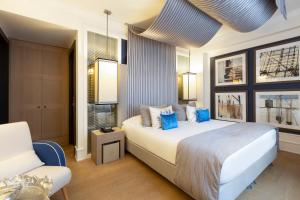 Voodi või voodid majutusasutuse Eight Hotel Paraggi toas