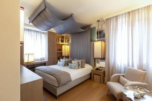 Voodi või voodid majutusasutuse Eight Hotel Paraggi toas