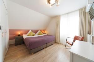 Postel nebo postele na pokoji v ubytování Hotel-Restaurant de Boer'nkinkel