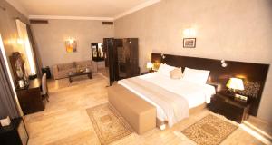 Palais Du Desert Hotel & Spa客房内的一张或多张床位
