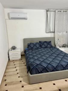 Cama ou camas em um quarto em Celeste Apartment