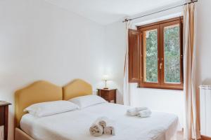 Postel nebo postele na pokoji v ubytování Vallicciola Nature Hotel