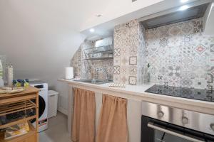A kitchen or kitchenette at Angolo del Sole Még 4 kép