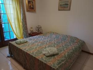 Postel nebo postele na pokoji v ubytování Petit St George 100mt du lac a Montreux
