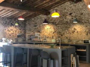 Restauracja lub miejsce do jedzenia w obiekcie Maison au coeur d'un vignoble
