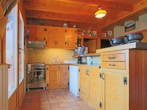 A cozinha ou kitchenette de Chalet Montvalezan-La Rosière, 9 pièces, 18 personnes - FR-1-398-582