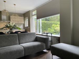Posezení v ubytování Comfortabel tot rust komen in het Veluwse bos