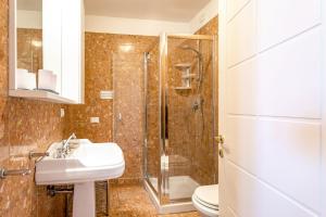 Kúpeľňa v ubytovaní Molino Stucky Residence Burchio Suite