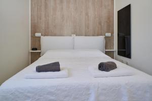 Postel nebo postele na pokoji v ubytování NOVIGRAD BOUTIQUE APARTMENT