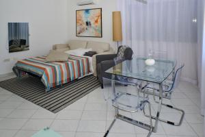 Postel nebo postele na pokoji v ubytování NOVIGRAD BOUTIQUE APARTMENT