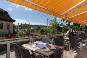 ห้องอาหารหรือที่รับประทานอาหารของ Maritim Hotel Würzburg