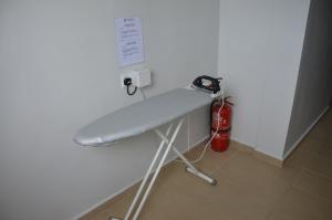 a white counter top in a room with a wall at Hotel Jelai @ Mentakab in Mentekab