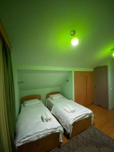 Voodi või voodid majutusasutuse Guest House “Timote” toas