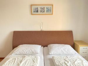 Postel nebo postele na pokoji v ubytování Callantsoger Staete A112