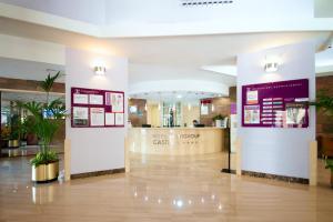 a lobby of a building with a pharmacy at Hotel Servigroup Castilla in Benidorm